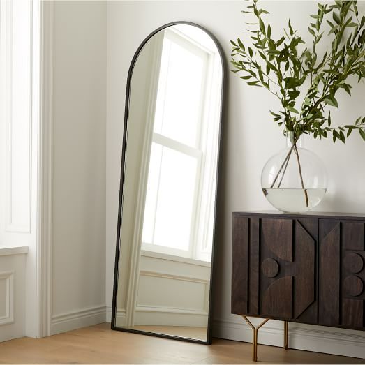 Standing Arch-shaped Mirror with a black frame