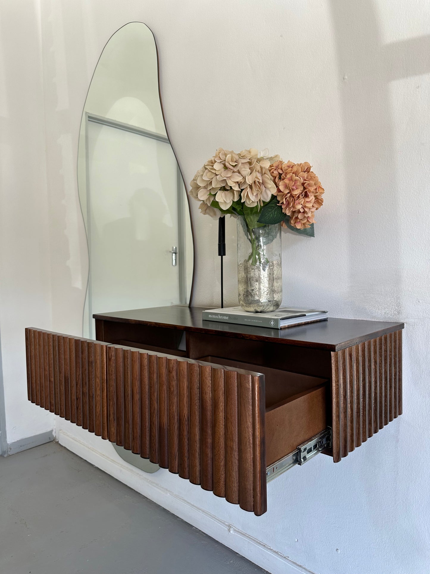 Ribbed Floating Shelves with Irregular Mirror